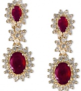 Bright and bold is the only way to describe EFFY Collection's stunning drop earrings. Crafted in 14k gold, earrings highlight oval-cut rubies (2-1/2 ct. t.w.) surrounded by a sunburst pattern of round-cut diamonds (9/10 ct. t.w.). Approximate drop: 1 inch. Approximate width: 1/3 inch.