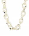 Go for a subtle hint of shimmer. This beautiful necklace highlights cultured freshwater pearls and sparkling Swarovski crystal accents. Set in sterling silver. Approximate length: 16 inches + 2-inch extender.