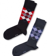 A classic pattern adds some professional polish to these dress socks from Hugo Boss.