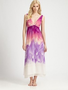 An ombre print of flower petals cascades down this lightweight feminine design of double-layered flowy chiffon. V-neckFront ruchingSleevelessV-backAbout 52 from shoulder to hemPolyesterMachine washImported