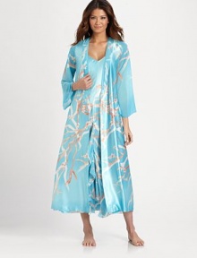 EXCLUSIVELY AT SAKS. Simply beautiful and fresh, this silky-smooth layering piece blossoms with an allover print and is finished with sheer illusion sleeves. Crossover v-neck frontLong sheer sleevesSelf-tie waistDual slit pocketsAbout 53 from shoulder to hemPolyesterMachine washImported