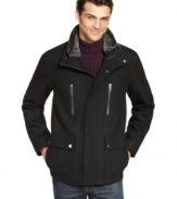 Faux fur at the collar infuses this classic wool-blend jacket from Michael Kors with modern luxury.