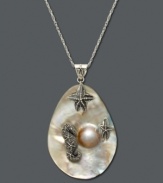 Whisk yourself away to the seashore. This unique pendant features a cultured mother of pearl drop (14 mm) decorated with two starfish and a seahorse in textured sterling silver. Sterling silver setting and chain. Approximate length: 30 inches. Approximate drop: 2-1/2 inches.