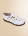 English style leather classics that are perfect for school, play and parties. Twin T-straps with adjustable buckles Perforations on toe Rubber traction sole Padded insole Imported Please note: It is recommended that you order ½ size smaller than measured. If your child measures a size 7.0, you may want to order a 6½. 