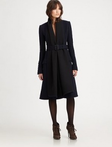 Guaranteed to turn heads, this wool coat features a waist-defining belt and flattering fit.Belted styleLong sleevesFlap pocketsBack ventFully linedAbout 40 from shoulder to hemWoolDry cleanMade in Italy of imported fabric Model shown is 5'9½ (176cm) wearing US size 4. 