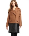 THE LOOKNotch lapelConcealed front snap closureLong sleevesFront flap pocketsExtended leather hemTHE FITAbout 36 from shoulder to hemTHE MATERIAL80% wool/20% nylonTrim: LeatherFully linedCARE & ORIGINDry clean by leather specialistImported