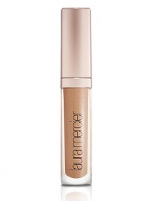 A high-shine, perfectly pigmented lip gloss with rich, long-lasting colour and brilliant shine that creates the appearance of fuller lips. Any skin tone is virtually enhanced by creating a subtle contrast in texture. With the unique blendof moisturizing, anti-aging, anti-oxidant and plumping ingredients provided by the Laura Mercier Lip Complex, the non-sticky gloss formula applies smoothly without feathering or bleeding. 