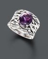 Brilliant color meets inspired design. Chic ring by the Effy Collection features a vibrant oval-cut amethyst (4-1/10 ct. t.w.) sitting in an intricately woven basket of sterling silver. Size 7.