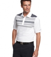 Keep your cool no matter where your at in this Greg Norman for Tasso Elba performance polo shirt featuring PlayDry® technology for increased comfort.