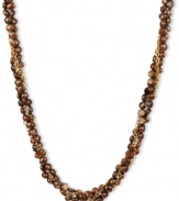 Go for a subtle hint of color. This beautiful necklace features bronze-colored cultured freshwater pearls (6-7 mm) set in 18k gold over sterling silver. Approximate length: 18 inches.