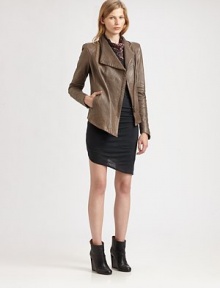 Embrace the urban-cool trend with this supple leather jacket, renewed by an oversized collar and asymmetrical hem. Oversized asymmetrical collarLong sleevesFront snap closures; zipperSlash pocketsAsymmetrical hemAbout 23 from shoulder to hem at longest pointLeatherDry clean with leather specialistImported of Italian fabricModel shown is 5'10 (177cm) wearing US size Small.