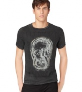 A unique skull graphic gives this Calvin Klein Jeans tee its edgy style.