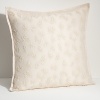 The Romantic traveler throw pillow is luxuriously crafted from creamy silk shantung and finished with floral-embroidered mesh overlay for a touch of couture-inspired style.