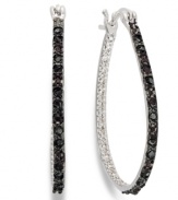 A practice in contrast. Victoria Townsend's shimmering hoops feature round-cut black diamonds (1/4 ct. t.w.) that pop against a sterling silver setting. Approximate diameter: 1 inch.