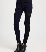 Shift into high-fashion gear with these leggings-style skinnies, defined by contrasting side panels that evoke a sporty vibe. THE FITRise, about 8Inseam, about 30THE DETAILSZip flyFive-pocket styleBody: Cotton/polyurethaneTrim: LeatherDry clean with leather specialistMade in USA of imported fabricModel shown is 5'11 (178cm) wearing US size 4.