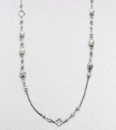 From the Quatrefoil Collection. An extra long sterling silver chain with bead and quatrefoil stations.Sterling silver Can be worn doubled Length, about 48 Lobster clasp closure Imported 