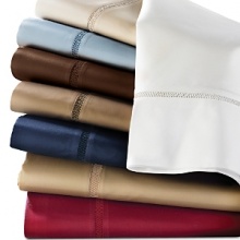 Regent T600 Sateen Sheets by Lauren Ralph Lauren. Cotton sateen sheets and pillowcases. Available in 8 solid colors: white, latte, almond, cinnamon, wisteria, plum, pomegranate, and coral.