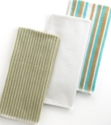 Grab style and keep function with a set of three kitchen towels that step forward in eye-catching color to wipe up spills, aid in prep and add an accent to your space. The ribbed side sets a sharp appearance for any room, while the highly absorbent terry quickly cleans up. Limited lifetime warranty.