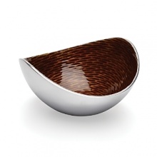 Handcrafted and polished, this aluminum nut bowl is embellished with a dark amber interior.