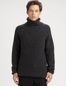 A soft jersey wool blend shapes a classic, versatile wardrobe staple for those approaching wintry days and nights.Turtleneck80% mercerized wool/20% nylonDry cleanImported