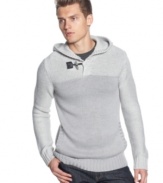 Top me over your a shirt or under a jacket with this pullover hooded merino sweater by Calvin Klein.