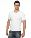 Short sleeve plain white shift with ribbed v-neck collar. Logo embroidered in white on left chest.