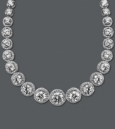 A chic collar perfect for cocktail hour. Arabella's dazzling design highlights dozens of round-cut Swarovski zirconias (55-1/3 ct. t.w.) set in sterling silver. Approximate length: 17 inches.