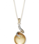 The golden touch. This rich pendant features a cultured golden South Sea pearl (12-13 mm) and swirls of round-cut diamond accents. Set in a 14k gold. Approximate length: 18 inches. Approximate drop: 1 inch.