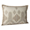 A Moroccan-inspired paisley print in soft hues, trimmed in brown and tan.