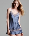 Lace accents lend luxe feminine flair to this chemise from Flora Nikrooz.