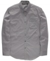 Fine lines. School yourself in the elements of style with this sleek striped shirt from Sean John. (Clearance)