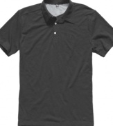 Prep up your t-shirt collection with this solid polo style by Volcom.