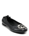 Tory Burch Reva classic leather ballet flats in distressed nappa leather features the metal logo medallion. A great basic for any season. Leather lining, rubber sole.