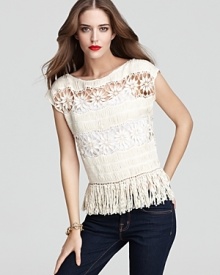 Flaunting a delicate crochet overlay and an attention grabbing fringed hem, the Alice + Olivia Crosby knit top delivers heightened style with trend-right bohemian flair.