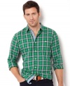 A contrast-colored placket adds a modern detail to this classic preppy plaid shirt from Nautica.