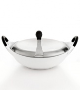 A new look. Give your kitchen a modern update with this incredibly light and sophisticated cast aluminum covered wok. Providing fast & even heat distribution, the sleek vessel features a phenolic resin stay-cool handle, easy-pour spout and a striking silhouette that creates an art show on the stovetop. 3-year warranty.