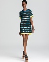 Electrifying style arrives with this Madison Marcus sequin stripe dress boasting flashes of neon on an abbreviated silhouette. The ultimate party look for the season, punctuate it with bold platforms and chunky bangles.