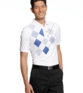 A slim fit and classic argyle will make you look like a pro on the green with this Greg Norman for Tasso Elba golf shirt featuring PlayDry® technology.