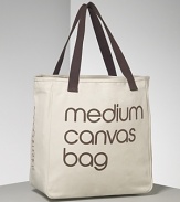 Medium cotton canvas bag. This sturdy tote bag is made from untreated, undyed, recyclable cotton canvas and is ideal to carry everything and for grocery shopping. Hand-print logo with non-toxic water-based ink. Double shoulder straps. Open top. Interior zip pocket. Unlined.