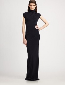 This sexy, floor-length silhouette is offset by a turtleneck and demure cap sleeves.TurtleneckCap sleevesFront panel constructionBack slitConcealed back zip About 47 from natural waist72% polyamide/28% spandexDry cleanMade in Italy of imported fabricModel shown is 5'9 (175cm) wearing US size 4. 