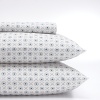 Made from soft cotton for a comfortable rest, this geometric-print sheet set is fashioned with an intricate pattern of circles and diamonds all over.