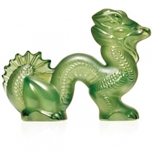 A symbol of wisdom, the captivating dragon figurine makes a formidable statement. Exceptional details and meticulous craftsmanship make this collectible a captivating object d'art.