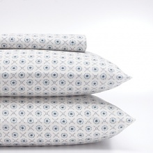 Made from soft cotton for a comfortable rest, this geometric-print sheet set is fashioned with an intricate pattern of circles and diamonds all over.