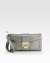 EXCLUSIVELY AT SAKS IN PEARL GREY. A light-catching metallic leather essential in a compact size, topped with signature metal hardware. Adjustable wrist strap, 6-7 dropFlap-lock closureOne inside zip pocketFully lined9¾W X 5¾H X 1½DMade in Italy