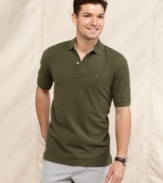 This polo shirt from Tommy Hilfiger is a solid addition to your polished summer look.