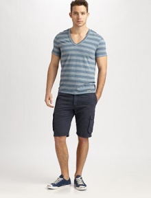 Contrasting stripes and an unfinished hem add some cool style to this comfortable v-neck design. V-neckShort sleevesUnfinished hemlineAbout 28 from shoulder to hem60% polyester/25% cotton/15% linenMachine washImported