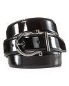 A patent leather belt with classic sheen for a super-polished look, featuring a silver-tone Gancini logo buckle for an extra stroke of refinement.