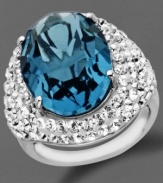 Take your cocktail hour look up a notch. Kaleidoscope's striking ring features an oval-cut blue crystal and clear crystals with Swarovski Elements. Crafted in sterling silver. Size 7, 8 and 9.