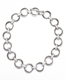 A new twist. Refresh your workday wardrobe with this tasteful twist link necklace from Lauren by Ralph Lauren. Crafted in silver tone mixed metal, it includes a toggle closure. Approximate length: 18 inches.