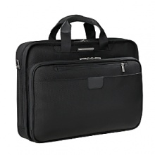 Extremely compact and easy to carry, this slim Briggs & Riley briefcase holds all your tech gear without slowing you down. It boasts a SpeedThru™ pocket for hassle-free airport security checks, a porthole for an MP3 player headphone cord, and organizer pockets for pens, business cards, flash sticks, a key fob and more. Slip back pocket allows case to slide over the Outsider® luggage handles. Fits most 14 laptops.